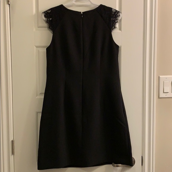 Timeless black dress with the prettiest details. - Picture 2 of 2